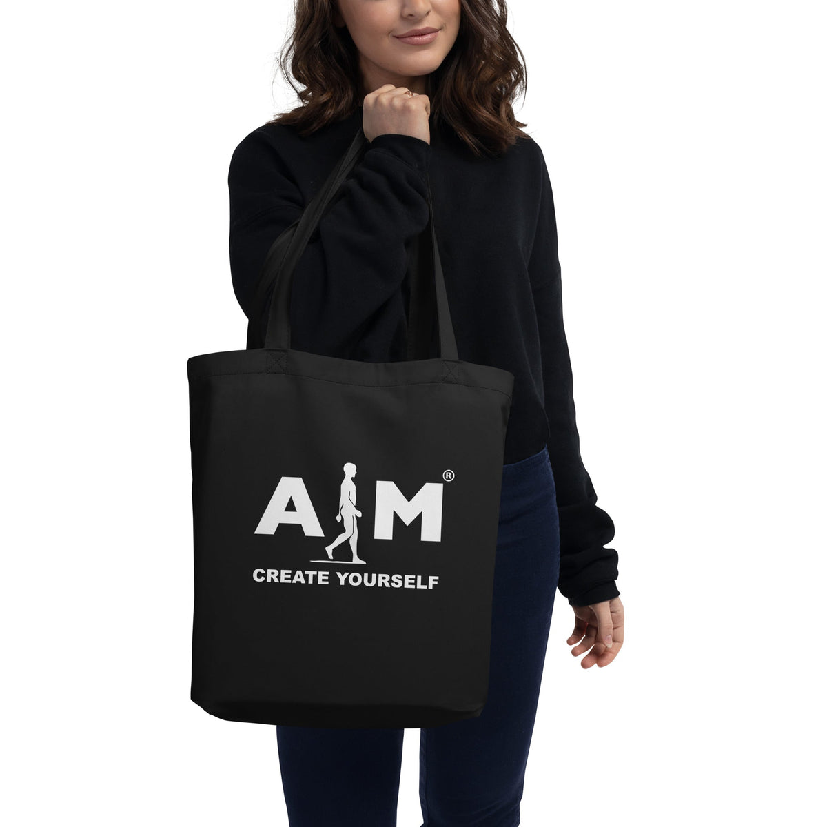 Eco tote bag by AIM ATTITUDE featuring a customizable design, made from sustainable materials, with sturdy handles and spacious interior.