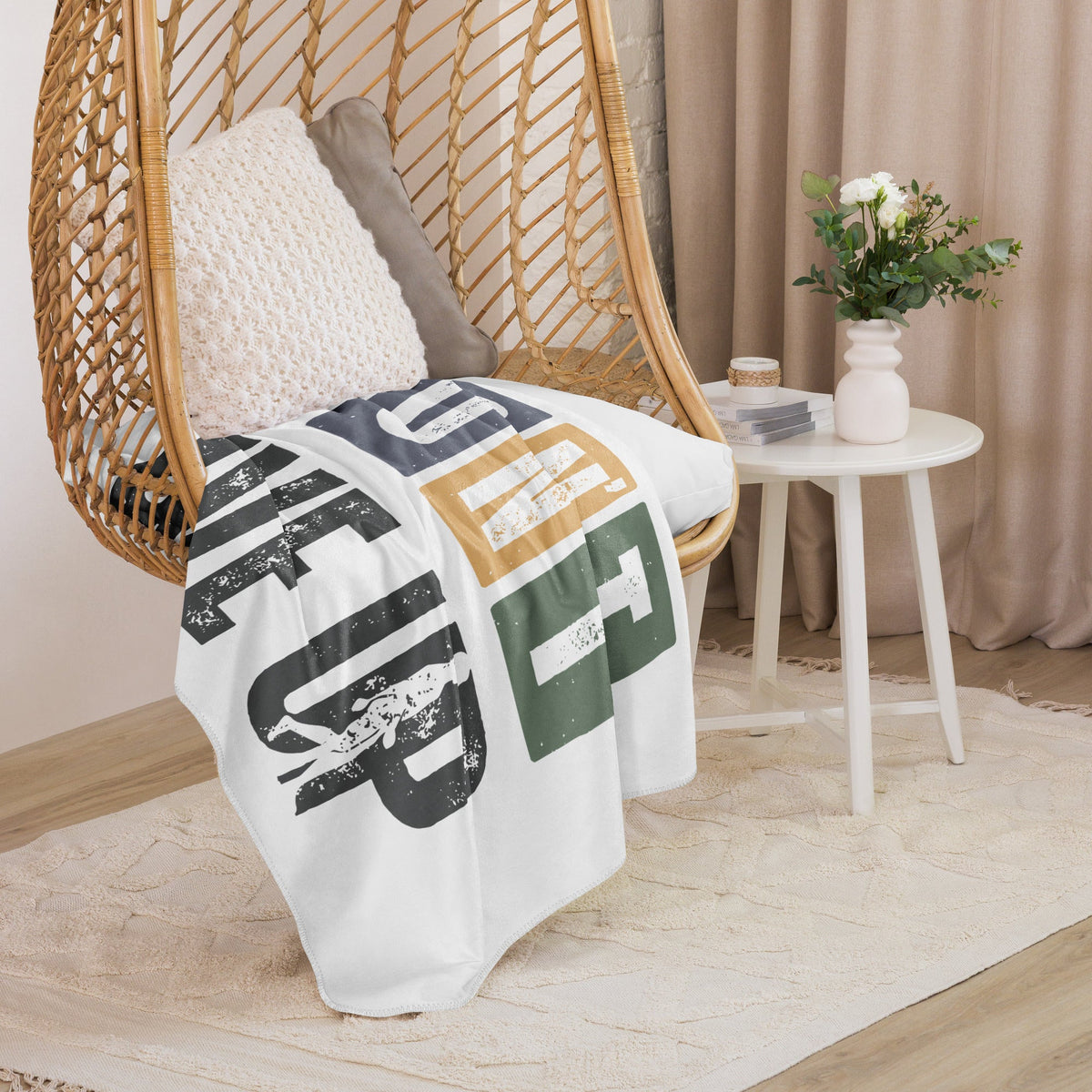AIM ATTITUDE Don't Give Up Sherpa blanket with soft, cozy fabric featuring motivational text design on a plush blanket.