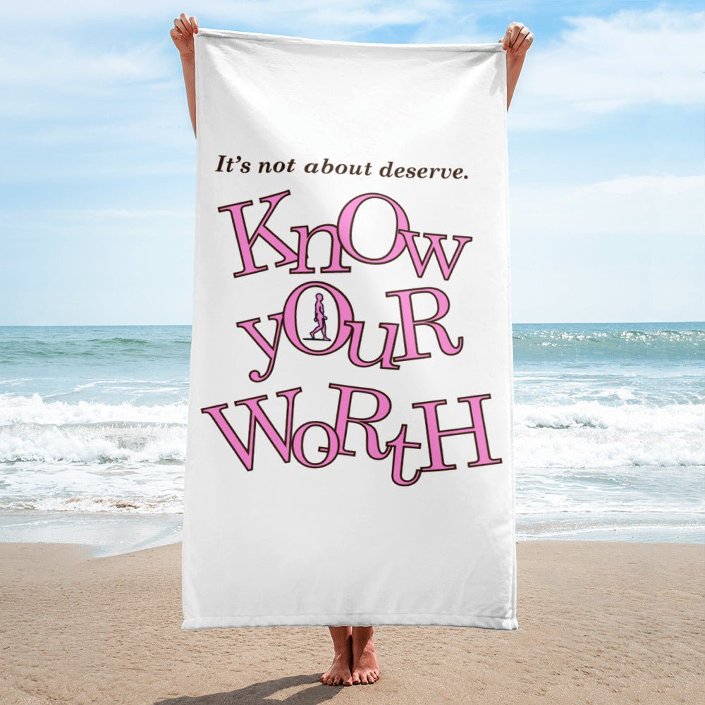 AIM ATTITUDE Know Your Worth towel featuring bold text design on soft fabric, perfect for bathroom or beach use.