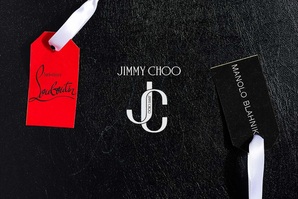 A mockup showcasing three Luxury Shoes brand labels on a textured black surface: a red tag with 'Christian Louboutin' written in cursive script, a black tag with 'JIMMY CHOO' in white serif lettering, and a black tag with 'MANOLO BLAHNIK' in gold serif lettering.